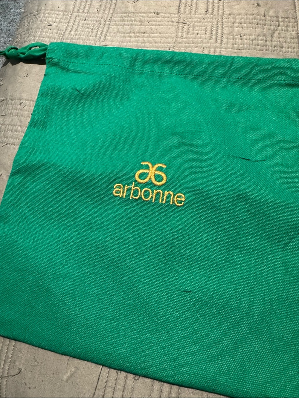 Arbonne Green Drawstring Cosmetic Pouch with Gold Logo